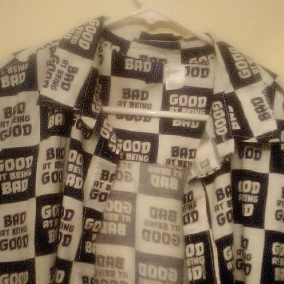 Button down tee shirt with collar and slits on eac side saying bad at being good - Picture 2 of 7
